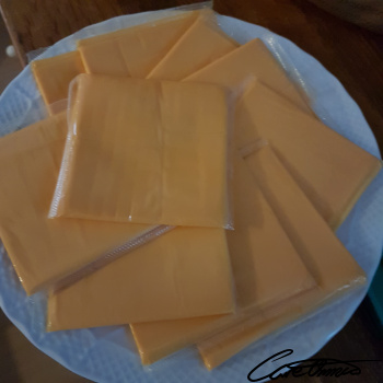 Image of American Cheese (Restaurant) that contains energy (atwater specific factors)
